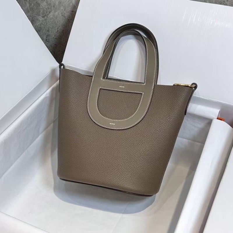 H**mes shopping bags